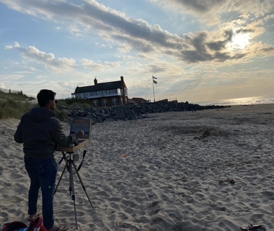 sun-behind-the-dark-cloud-on-the-beach-insitu_tushar-sabale